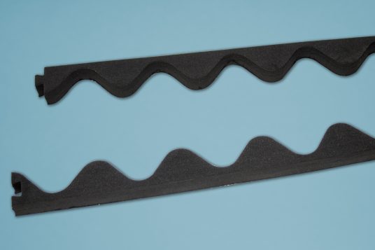 
                                                            Toothed strips for corrugated bitumen sheets
                                                    